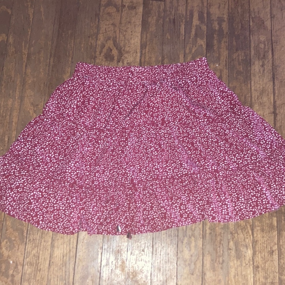 red skirt with white flowers